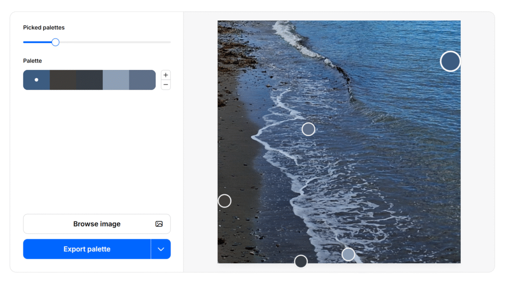 Small colour palette of five colours next to an image the edge of the sea on a beach. The colours represent some of the colours from the photo.